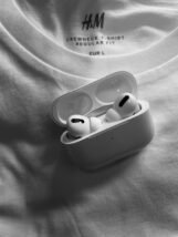 white apple earpods in case